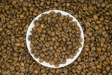 Coffee grains. Background of roasted coffee beans brown
