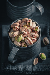 A pile of pistachios as a ingredient and apetizer