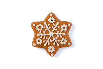 Fototapeta na wymiar Decorated gingerbread star on white background