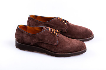 pair of black leather shoes isolated on white background