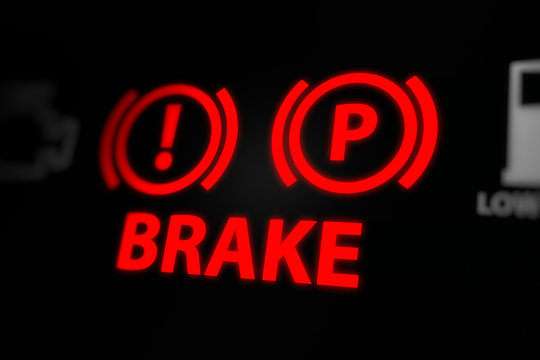 Brake Warning Light on Car Dashboard.  