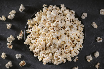 Homemade popcorn on the dark background
