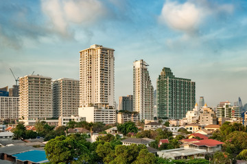 Fototapeta na wymiar Modern residential houses in green area of Bangkok