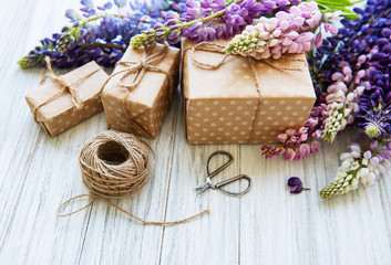 Lupine flowers and gift boxes