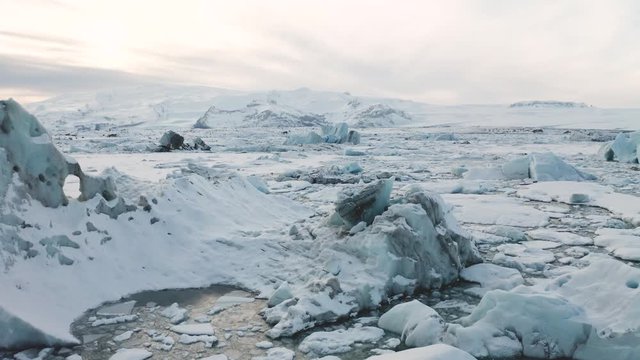 Aerial view of the J kuls rl n glacial lagoon and floating icebergs. The beginning of spring in Iceland