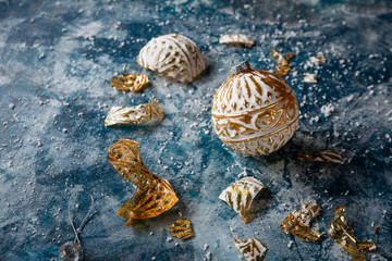 Glass christmas decoration on blue background