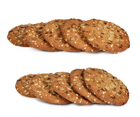 oatmeal cookies with sunflower seeds and sesame isolate on white.Entire image in sharpness.