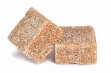 pieces of cane sugar isolate on white.Entire image in sharpness.