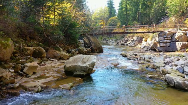mountain river flowing between rocky shores in Carpathians mountains, Ukraine