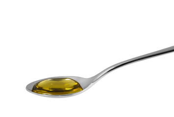 steel spoon with honey isolate on white.Entire image in sharpness.