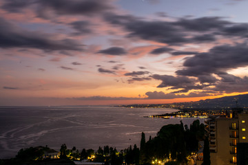 Obraz premium Sunset with a view in Taormina, Sicily, Italy