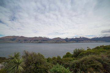 Fototapeta na wymiar Amazing view of Lake Pukaki with snow capped mountains in the background.View from Queenstwon New Zealand.
