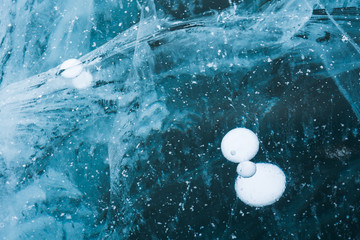 Naklejka na ściany i meble Ice bubbles on the ice of Baikal