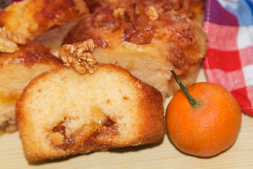 orange and walnut dessert on wood