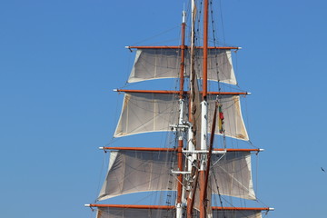 Sail ship in city with mast in Klaipeda in Lithuania. Travelling with cruise ship in summer on...