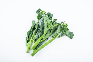 Fresh green vegetable kale heart on white background