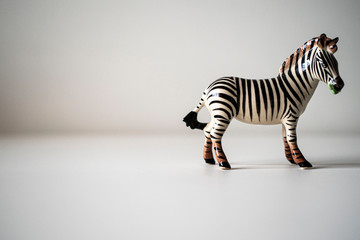 porcelain zebra figurine on a white background