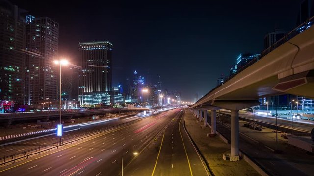 Sheikh Zayed Rd Highway & Dubai Metro along Jumeirah Beach Residence time lapse at night
