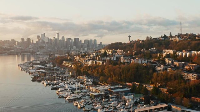 Drone Aerial Push on Lake Union with Seattle Skyline in background. During sunrise. Fremont, Seattle, WS