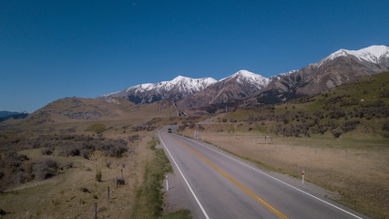 Aerial View of Castle Hills at Arthur's Pass route,South Island New Zealand with snowcap mountain in background.