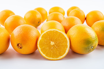 Fresh Nangan Navel Orange and pulp slices on white background