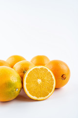 Fresh Nangan Navel Orange and pulp slices on white background