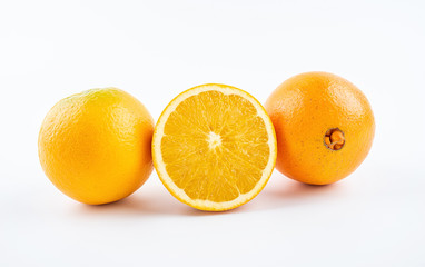 Fresh Nangan Navel Orange and pulp slices on white background