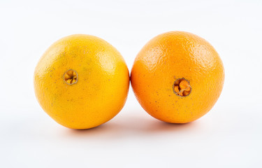 Two fresh fruits Gannan navel orange on white background
