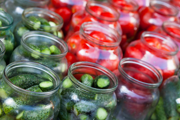 Pickling (canning) tomatoes and cucumbers.