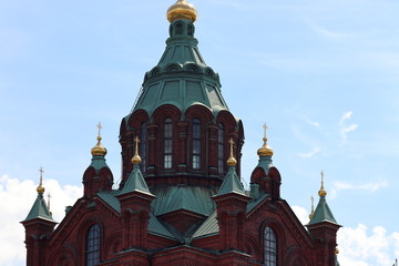 Fototapeta na wymiar Uspenski cathedral in Helsinki in Finland on holiday. Travelling with cruise ship in summer.