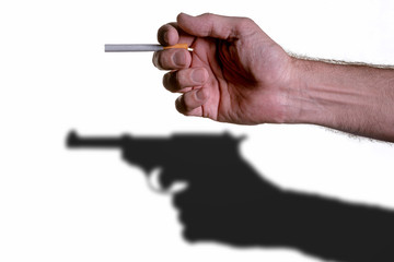 Man's hand with cigarette, and a shadow with gun
