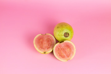  guava on a pink background