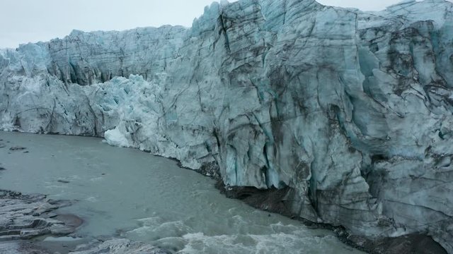 The staggering Russell Glacier on the western edge of the ice cap in Greenland, in all its glory, classic drone reveal shot