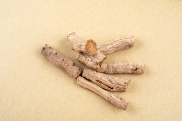 Fried Achyranthes bidentata with Chinese herbs on yellow paper