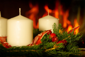 Christmas Wreath on the fireplace background.