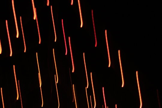 Abstract multi colored straight light trails background.