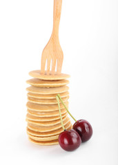 Stack of mini pancake isolated on white