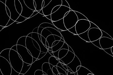 Abstract light trails background monochrome pattern.