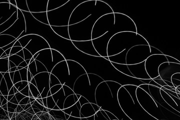 Abstract light trails background monochrome pattern.