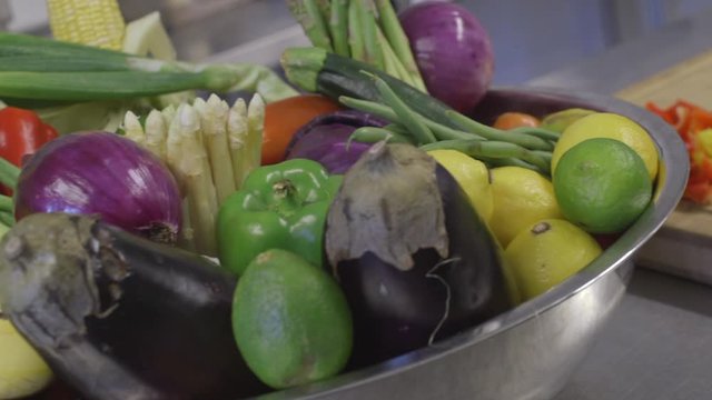 Paella event catering with a healthy choice pepper and squash onion in a farm to table basket