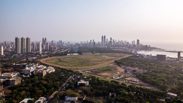 High angle view of Mahalakshmi Race Course Track in front of The Imperial towers and Tardeo business and financial district of Mumbai, India