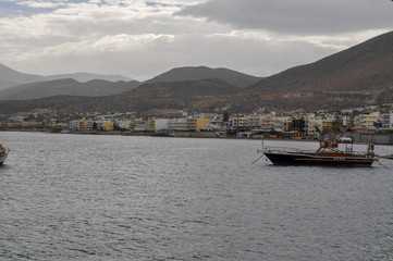 Fototapeta na wymiar Pier with yachts of the island of Crete in Aegean sea