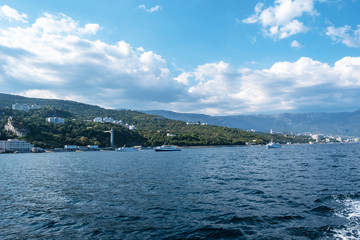 Fototapeta na wymiar View from the sea to the southern coast of Crimea in the Yalta region.