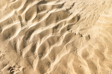 Quaint beige and grey sand background