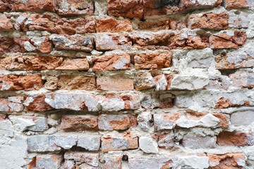 Old red grunge brick wall texture grunge background with vignetted corners