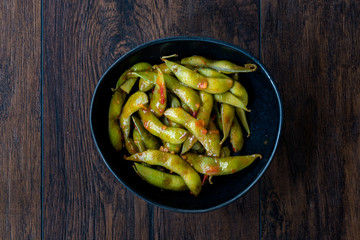 Spicy Sambal Edamame with Chopsticks / Spiced Style with Red Hot Chili Sauce.
