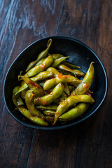 Spicy Sambal Edamame with Chopsticks / Spiced Style with Red Hot Chili Sauce.