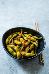Spicy Sambal Edamame with Chopsticks / Spiced Style with Red Hot Chili Sauce.