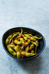 Spicy Sambal Edamame with Chopsticks / Spiced Style with Red Hot Chili Sauce.