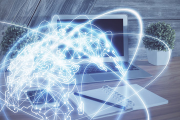 Multi exposure of business theme icons and work space with computer background. Concept of success.